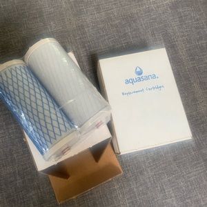Aquasana filter replacements- 2 boxes wi/ 2 new filters wrapped in plastic.